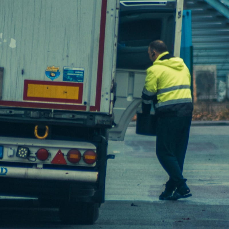 Truck driver loading merchandise