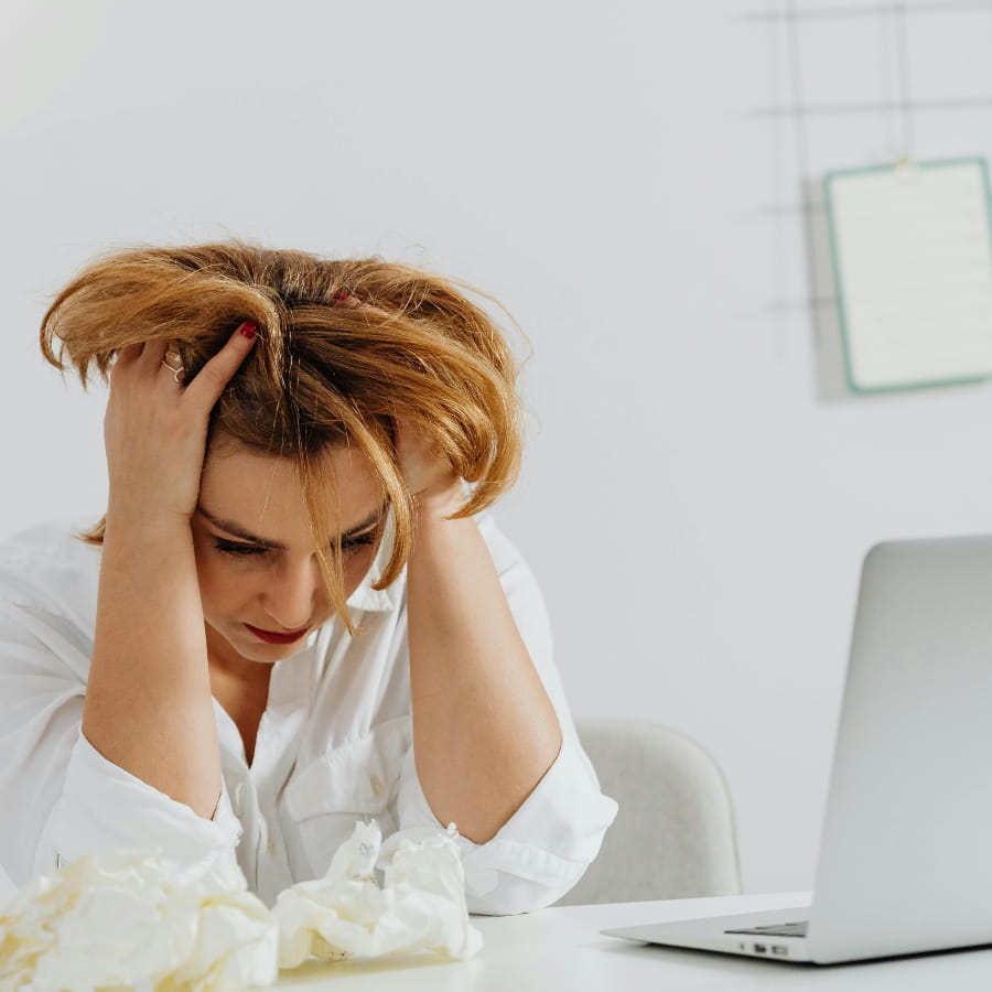 Person frustrated about late tax filing